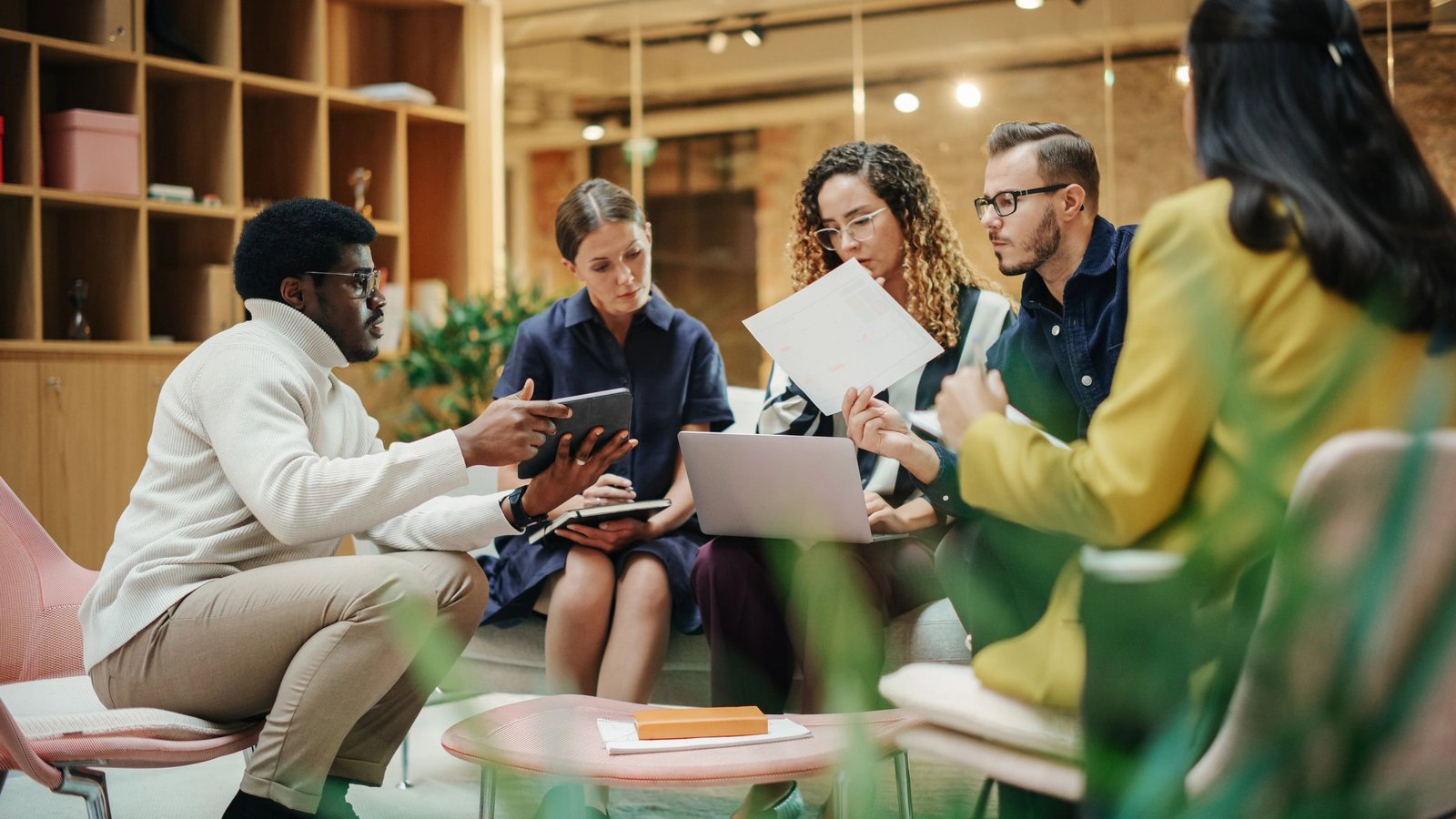Leadership team meeting in a modern office