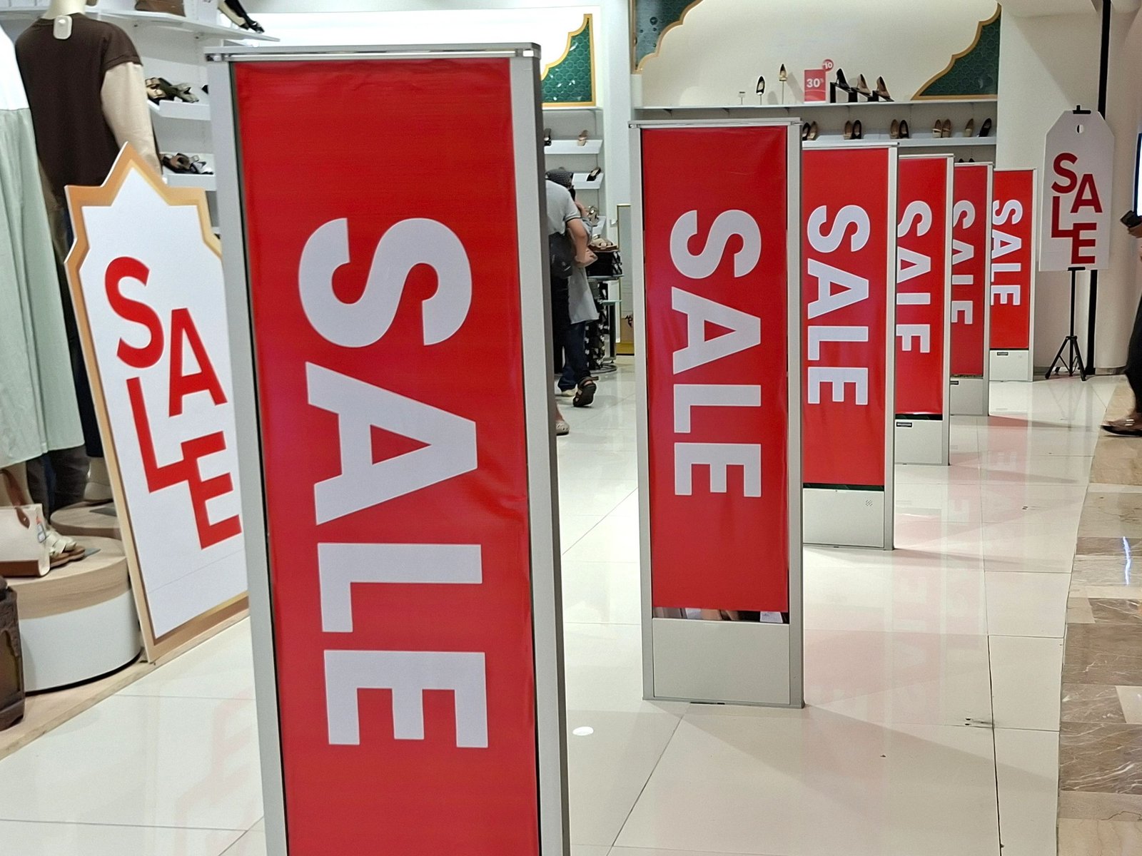 Bright retail storefront with sale banners